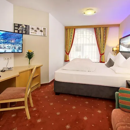 Отель Alpinstyle 4*