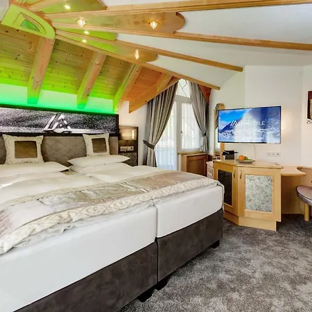 Отель Alpinstyle 4*